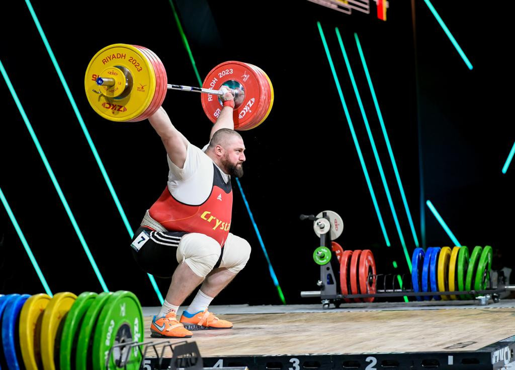 
Lasha Talakhadze, pictured, made 220-253-473 ahead of the Armenian Varazdat Lalayan on 212-248-460 and Gor Minasyan, lifting for Bahrain, on 213-246-459 for his seventh world title ©IWF