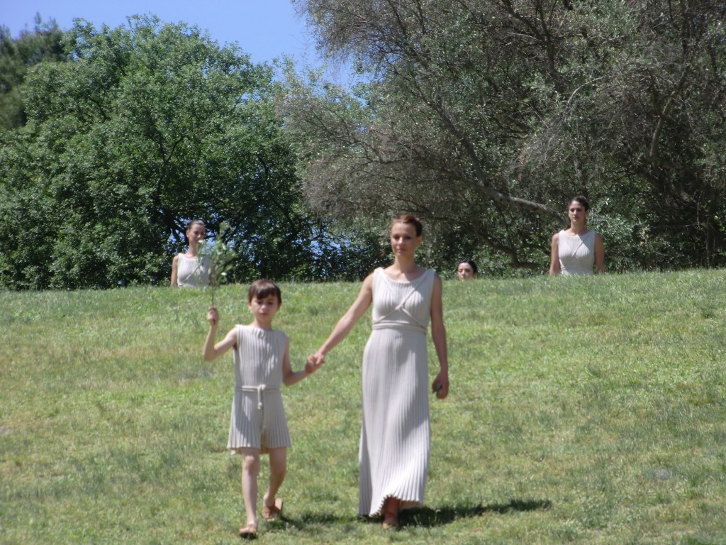 Choreographer Artemis Ignatiou with her son Karolos on the hillside in Olympia