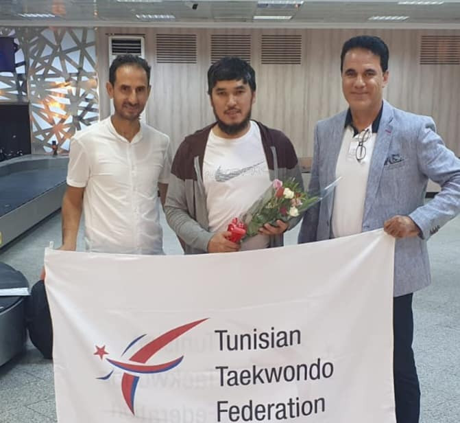 Kazakhstan's Yesbul Sultanov, middle, is the new head coach of the Tunisian taekwondo team ©TTF