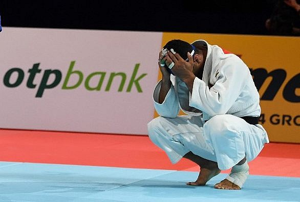 Iran's Saeid Mollaei reacts after losing to Belgium's Matthias Casse in his semi-final fight at the 2019 Judo World Championships in Tokyo so he would not have to fight an Israeli in the final ©Getty Images
