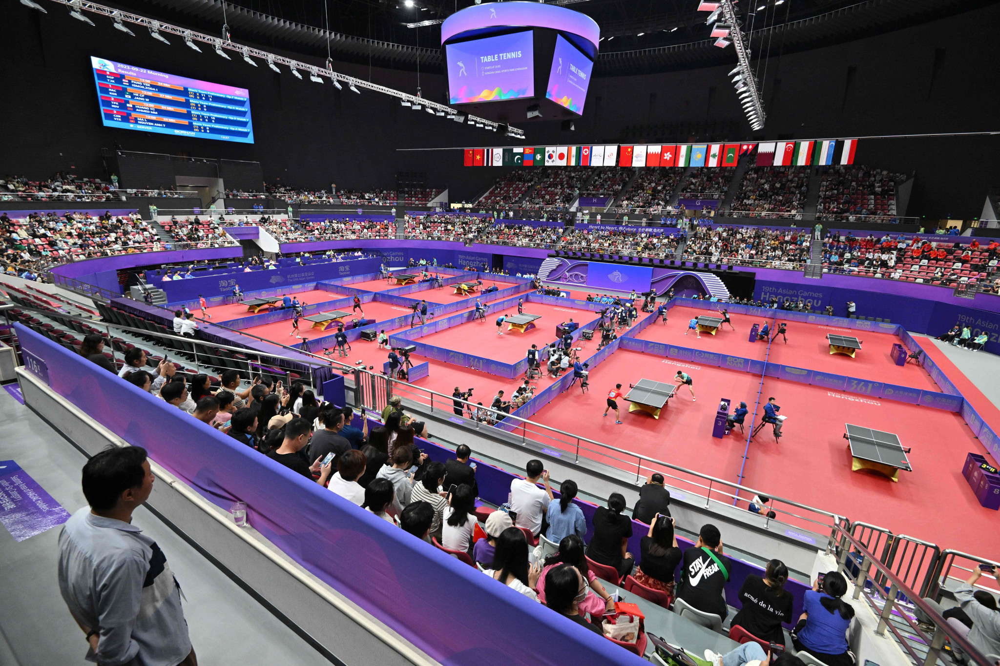 Table tennis tournaments also advanced with excitable fans watching on at the Gongshu Canal Sports Park Gymnasium ©Getty Images