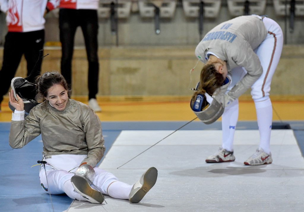 Azerbaijan’s Sabina Mikina celebrates winning the women's individual sabre title at the European Olympic qualifying event 