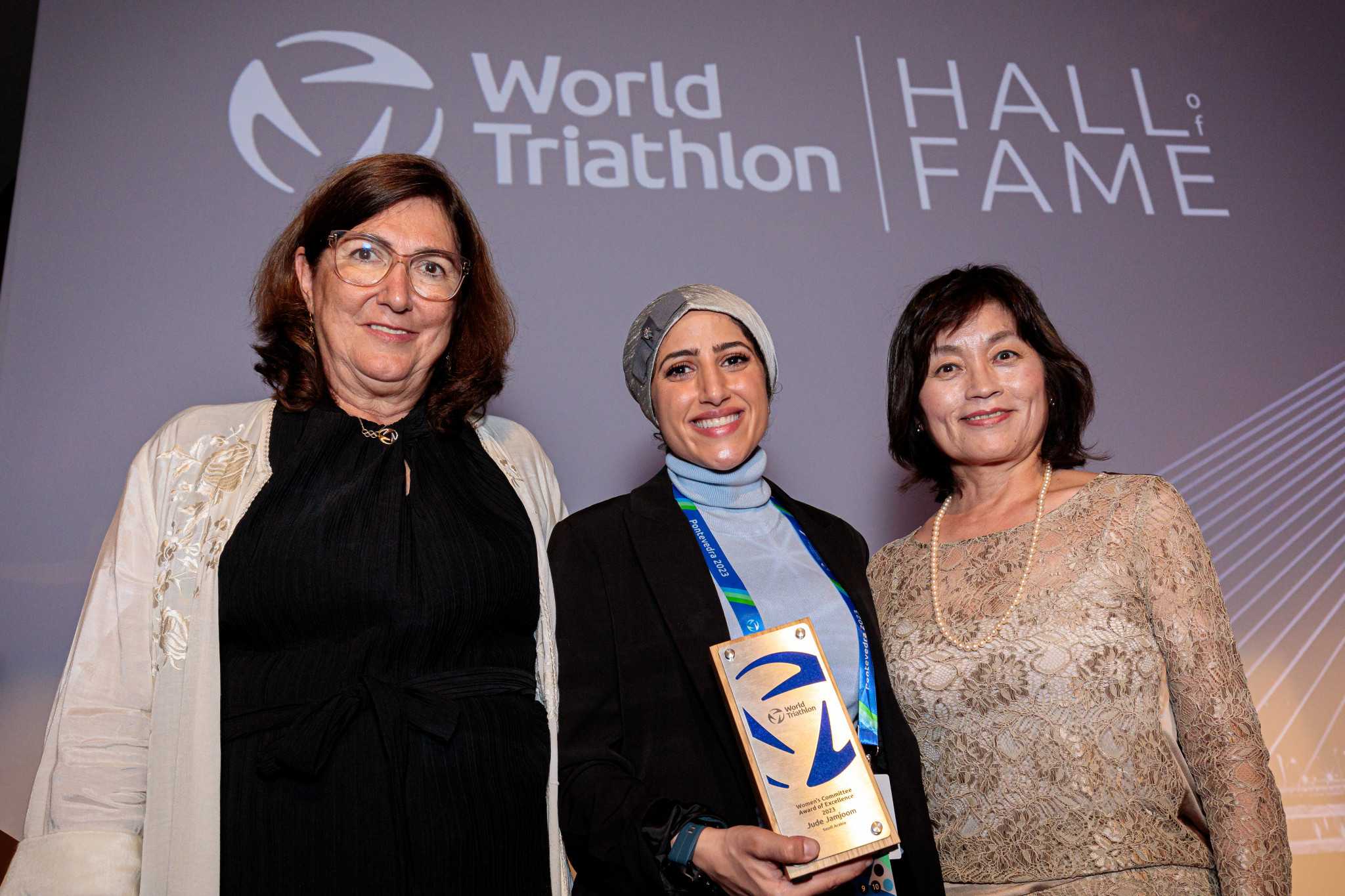 Saudi Arabia's Jude Jamjoom, centre, won the World Triathlon Women's Committee award of excellence ©World Triathlon