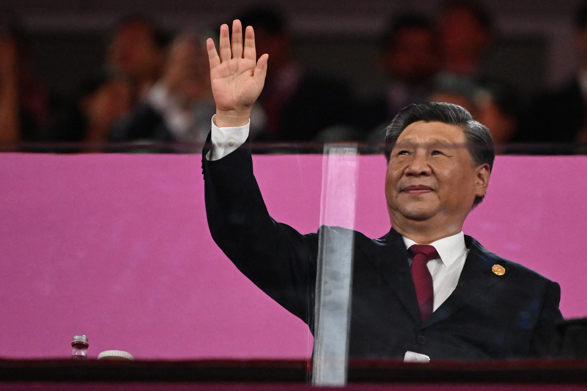 Chinese President Xi Jinping acknowledges the crowd before officially declaring the 19th edition of the Asian Games open ©Getty Images