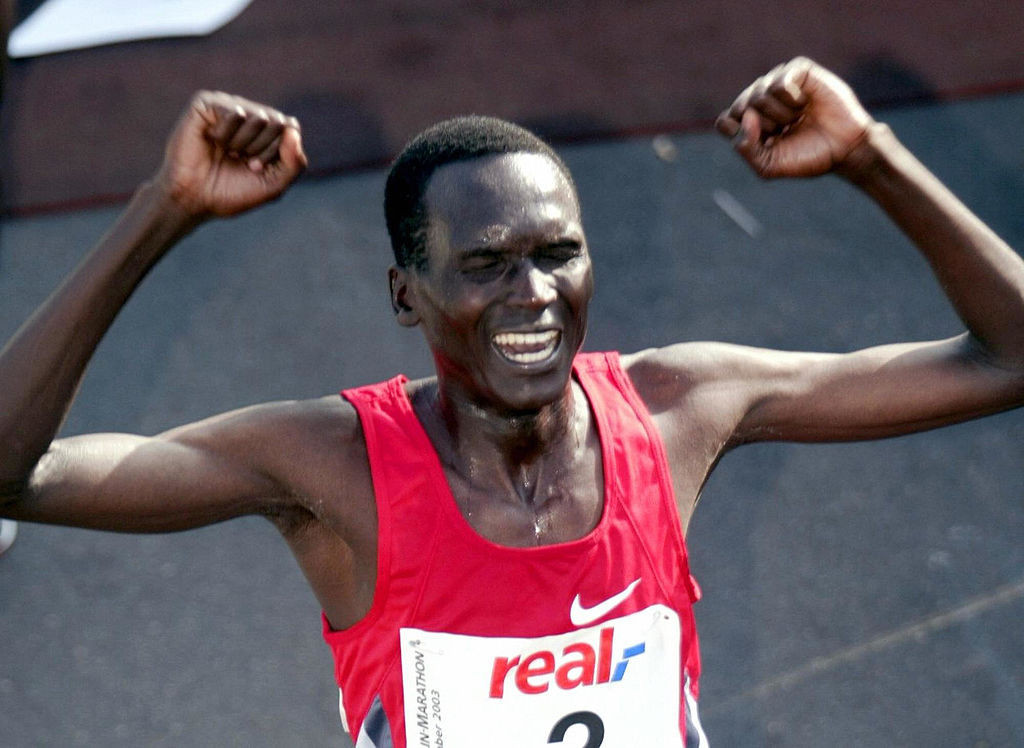 Kenya's Paul Tergat celebrates after winning the 2003 Berlin Marathon and setting the first of eight consecutive men's world records that have been set on that course ©Getty Images