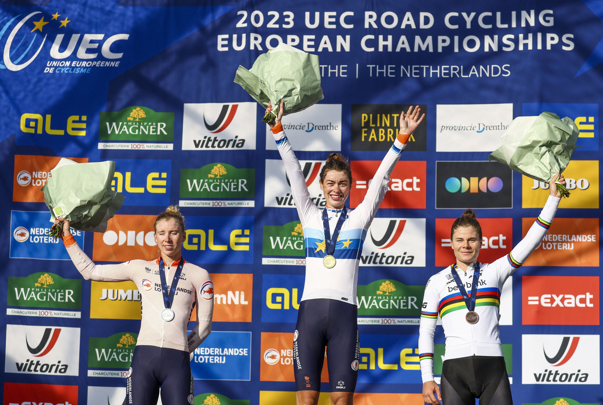 The podium for the elite women's road race in Drenthe, featuring a Dutch one-two of Mischa Bredewold, centre, and Lorena Wiebes, left ©Getty Images