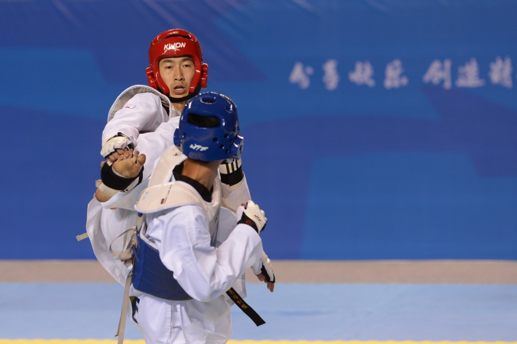  Zhao Shuai (in red in 2013) claimed under 58kg gold for China ©Getty Images