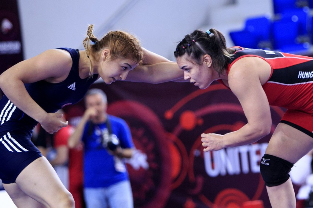 Turkey's Buse Tosun (left) qualified for Rio 2016 but had to settle for the women's freestyle 69kg silver medal