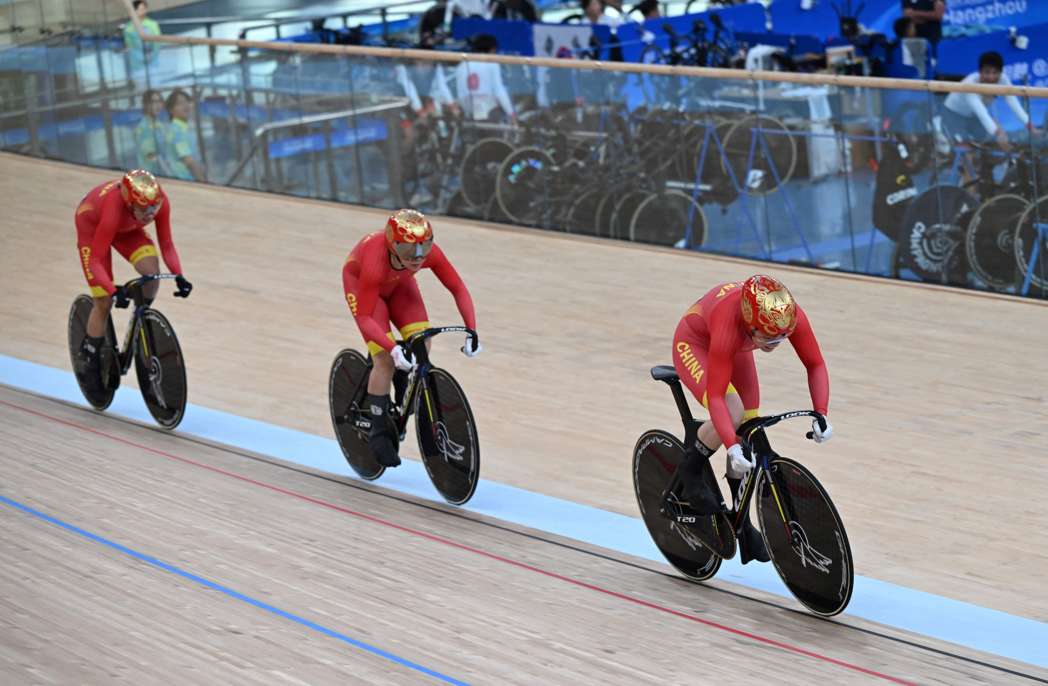 Bao Shanju, Guo Yufang, and Yuan Liying delivered men's team sprint gold for China ©Getty Images