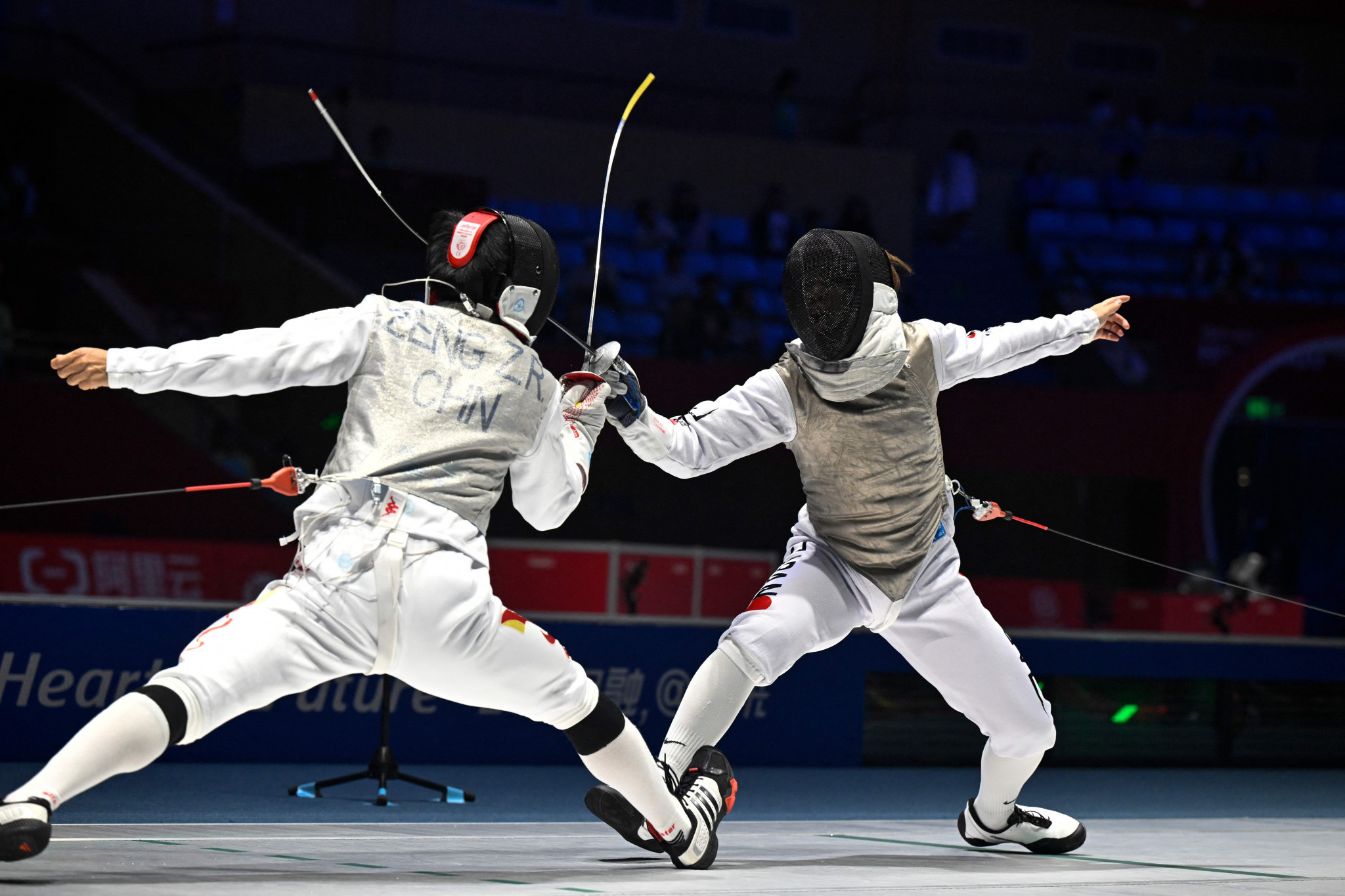 A fencing battle at the Paris 2024 Olympic Games. GETTY IMAGES