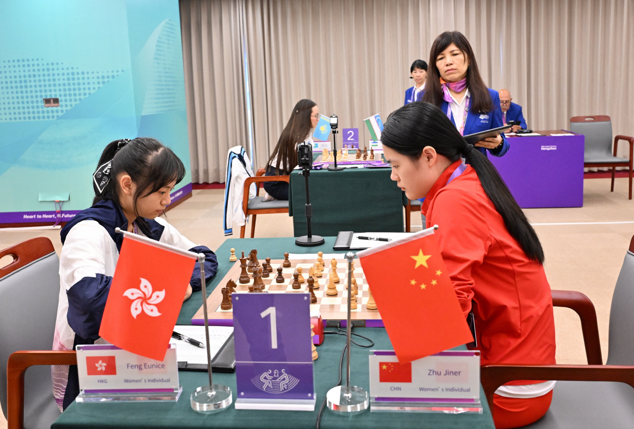 China take chess double on its first medals day
