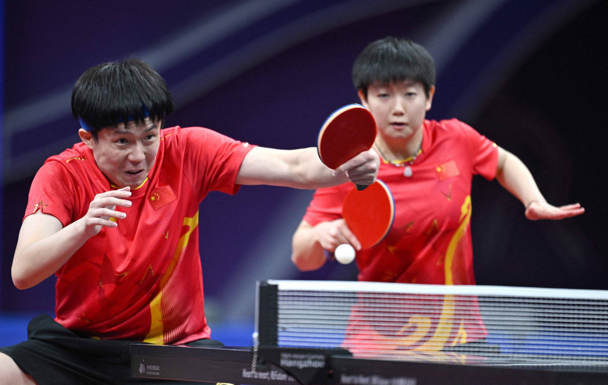 China's Wang Chuqin, left, and Sun Yingsha defended their Asian Games mixed doubles table tennis title with a comfortable win over compatriots Lin Gaoyuan and Wang Yidi ©Getty Images