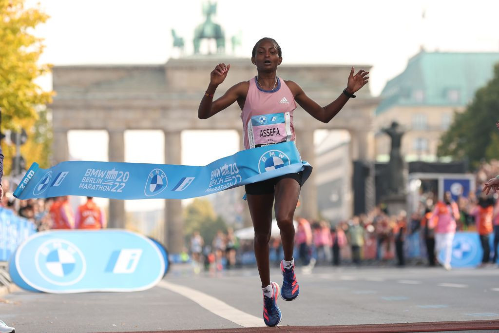 Tigist Assefa of Ethiopia sets a women's world marathon record of 2hr 11min 53sec in Berlin - but how much credit should be given to the shoes she wore? ©Getty Images