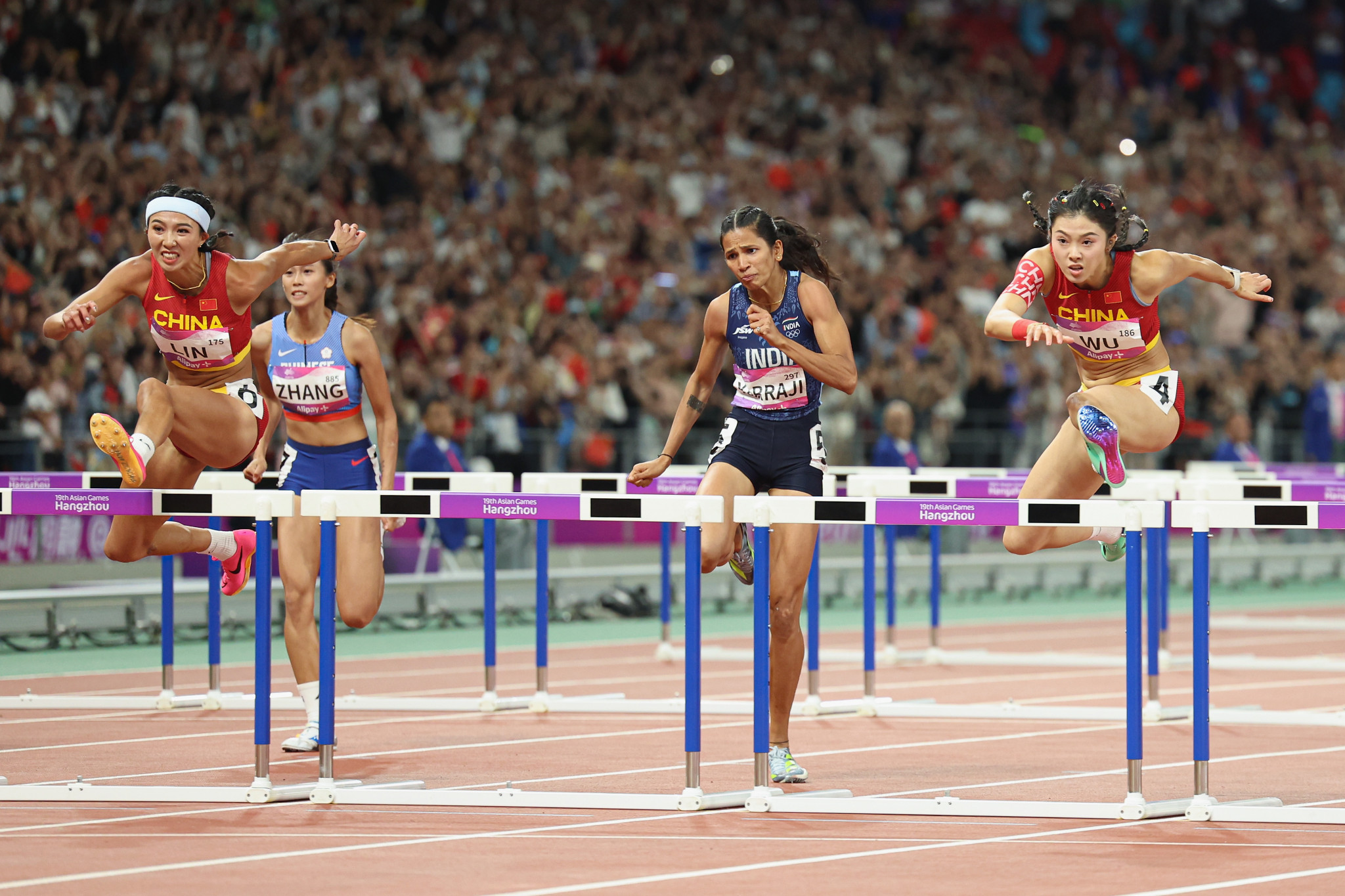 Wu Yanni, right, was allowed to run in the 100m despite committing a false start beforehand which should have resulted in an immediate disqualification ©Getty Images