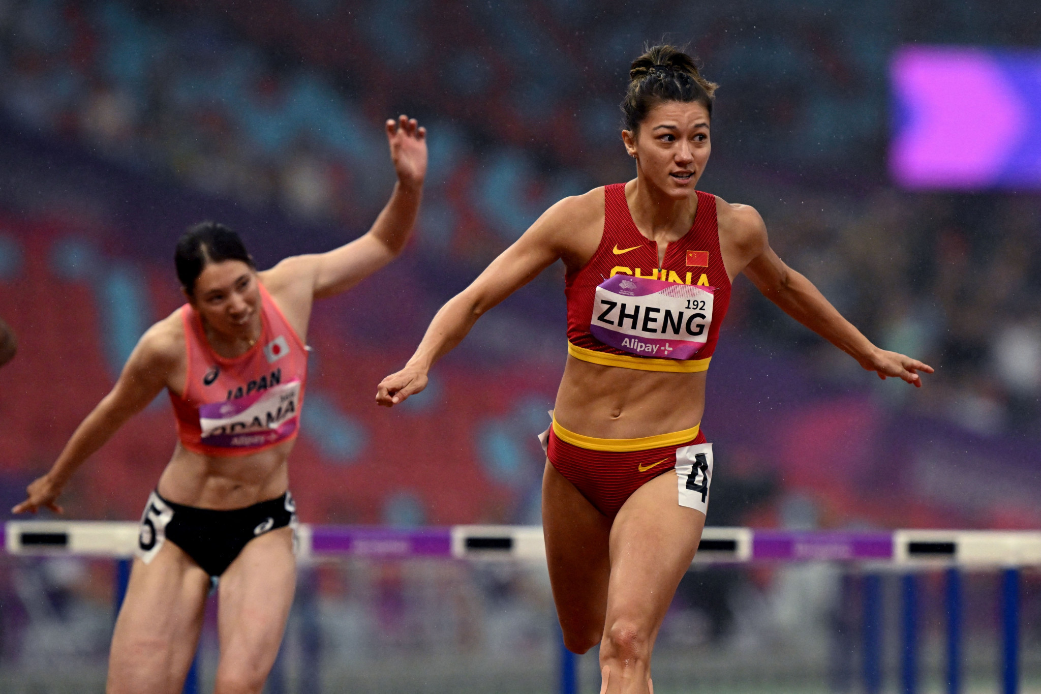 Home favourite Zheng Ninali had a day to remember as she topped the standings in the women's heptathlon event ©Getty Images