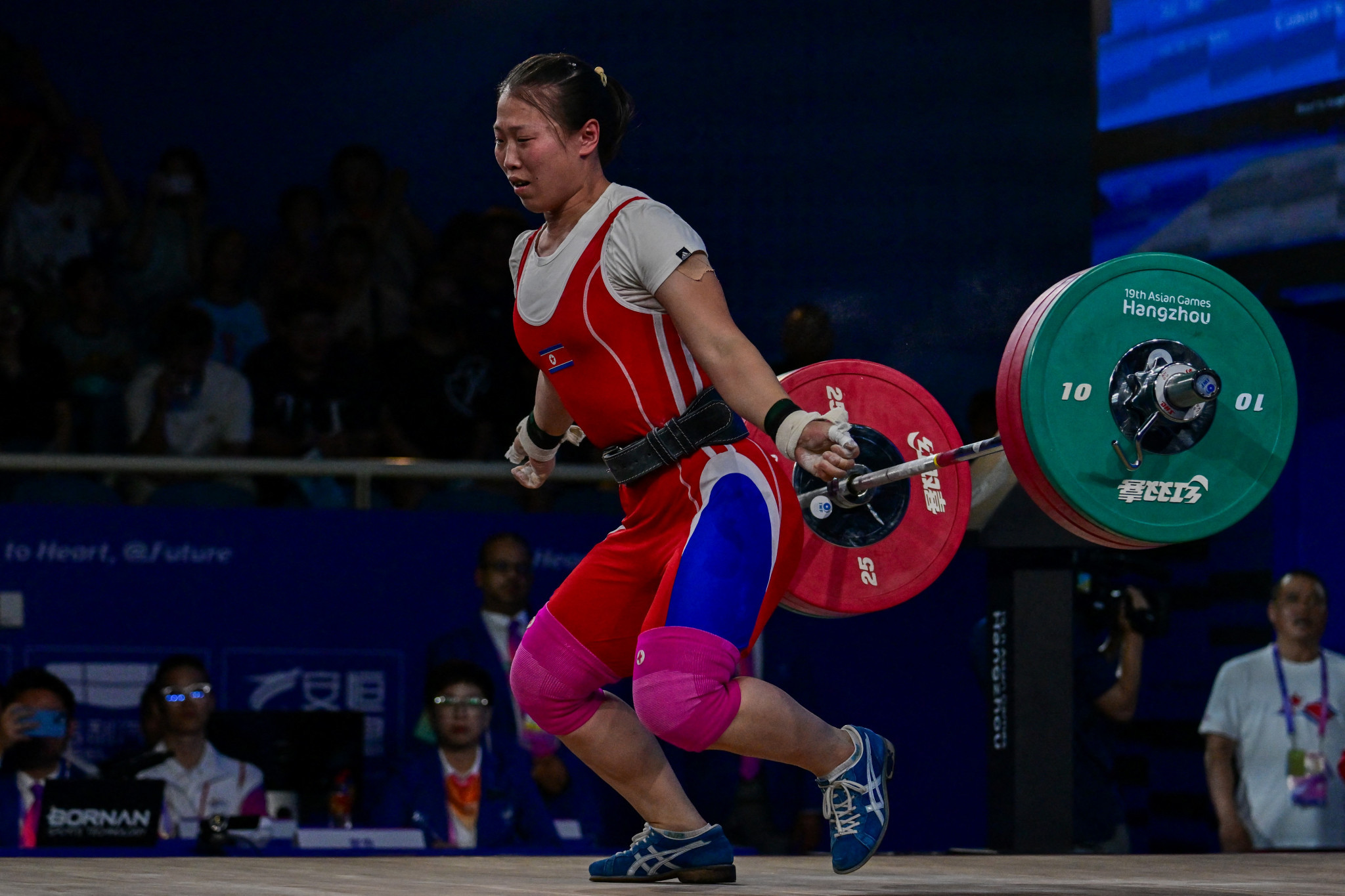 North Korean Rim Un-sim finished with a total of 251kg after a snatch score of 111kg and a clean and jerk of 140kg to win the women's 64kg weightlifting title ©Getty Images