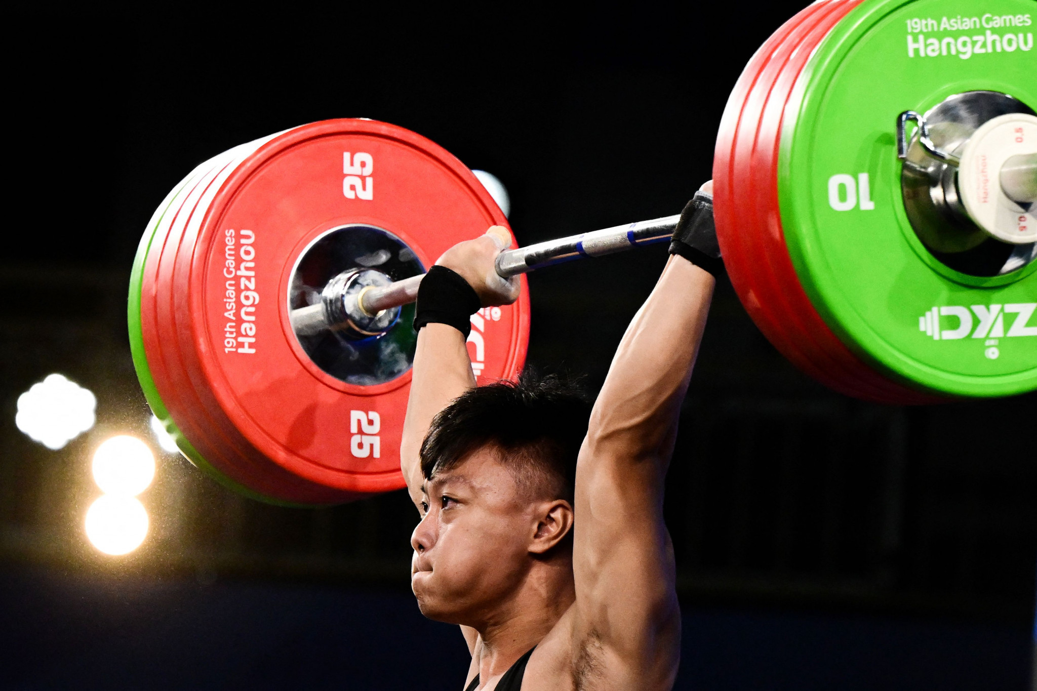 Rahmat Erwin Abdullah claimed the men's 73kg weightlifting gold medal with a Games record total of 359 ©Getty Images