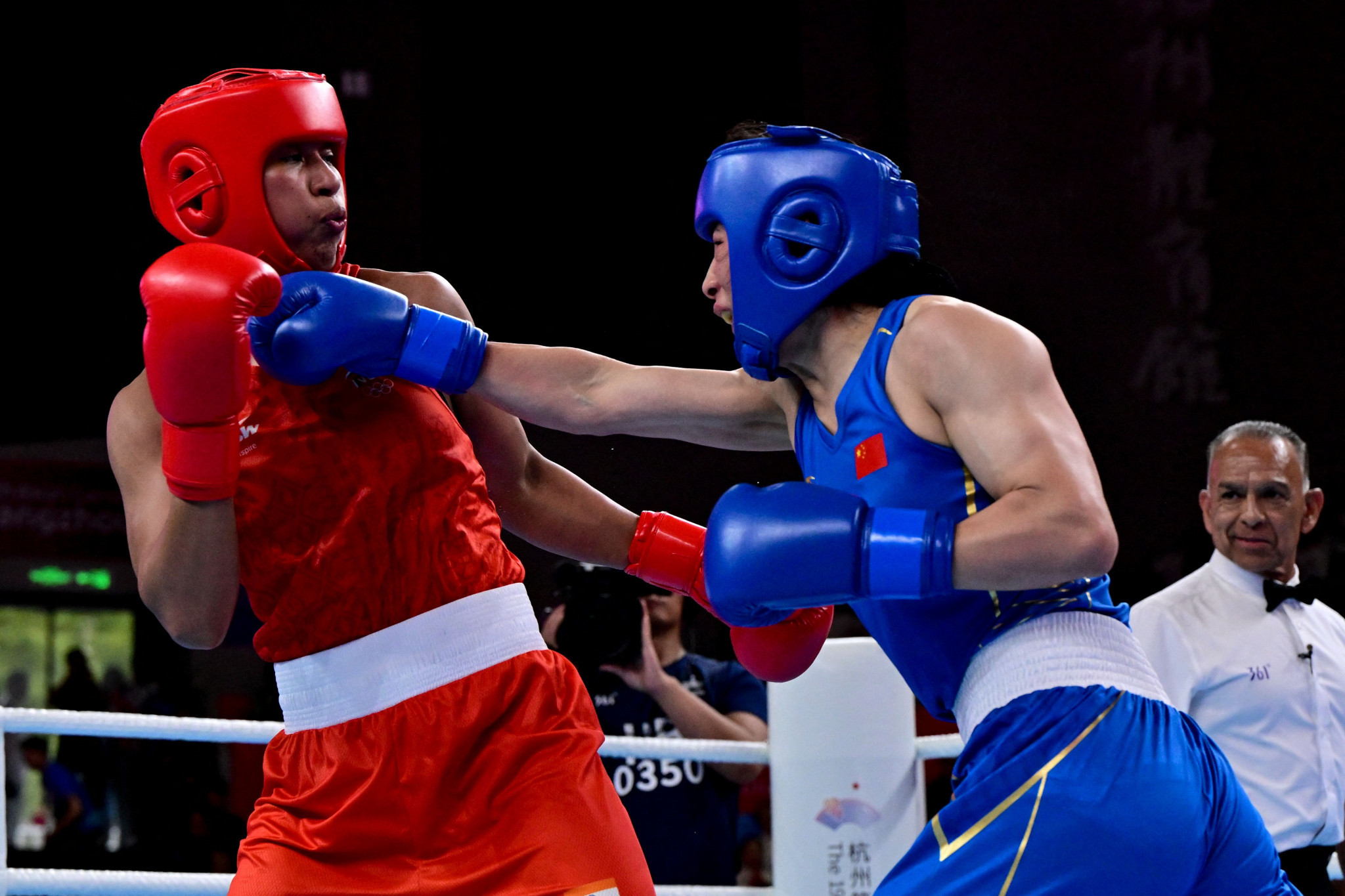 World champion Lovlina Borgohain of India, left, suffered a shock defeat in the women's 66-75kg boxing final to China's Li Qian ©Getty Images