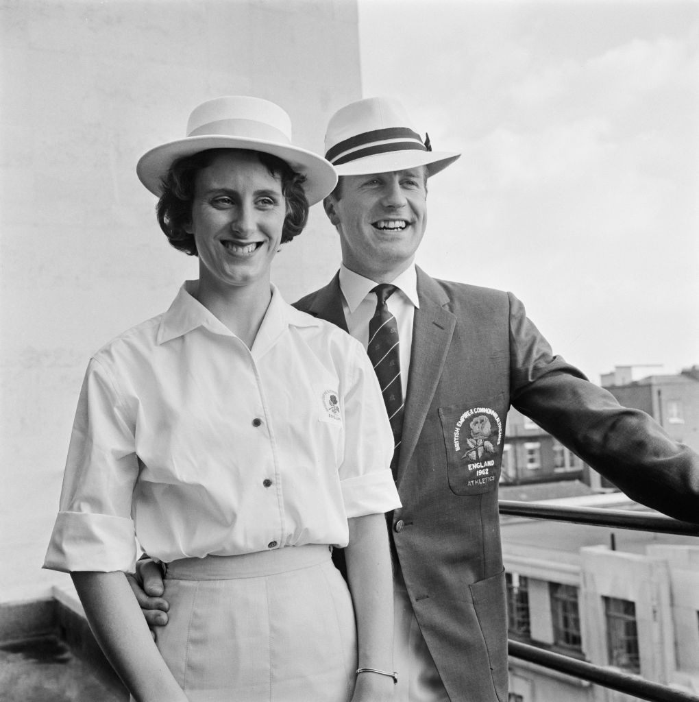 Sprinter David Jones, pictured with Dorothy Hyman, modelling the English team outfit for the 1962 Empire and Commonwealth Games, has died aged 83 ©Getty Images