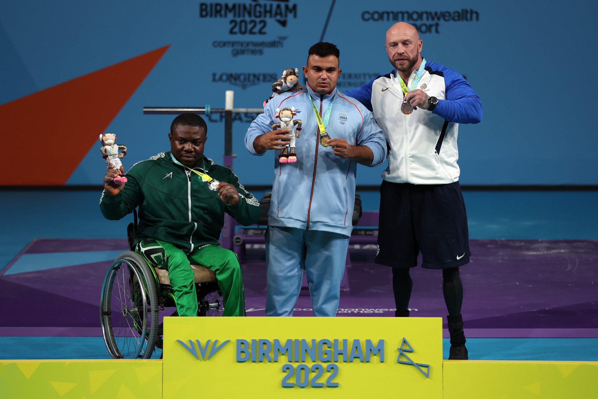 Indian Para powerlifter Sudhir, centre, has lost his Birmingham 2022 Commonwealth Games heavyweight gold medal after testing positive for a banned substance ©Getty Images
