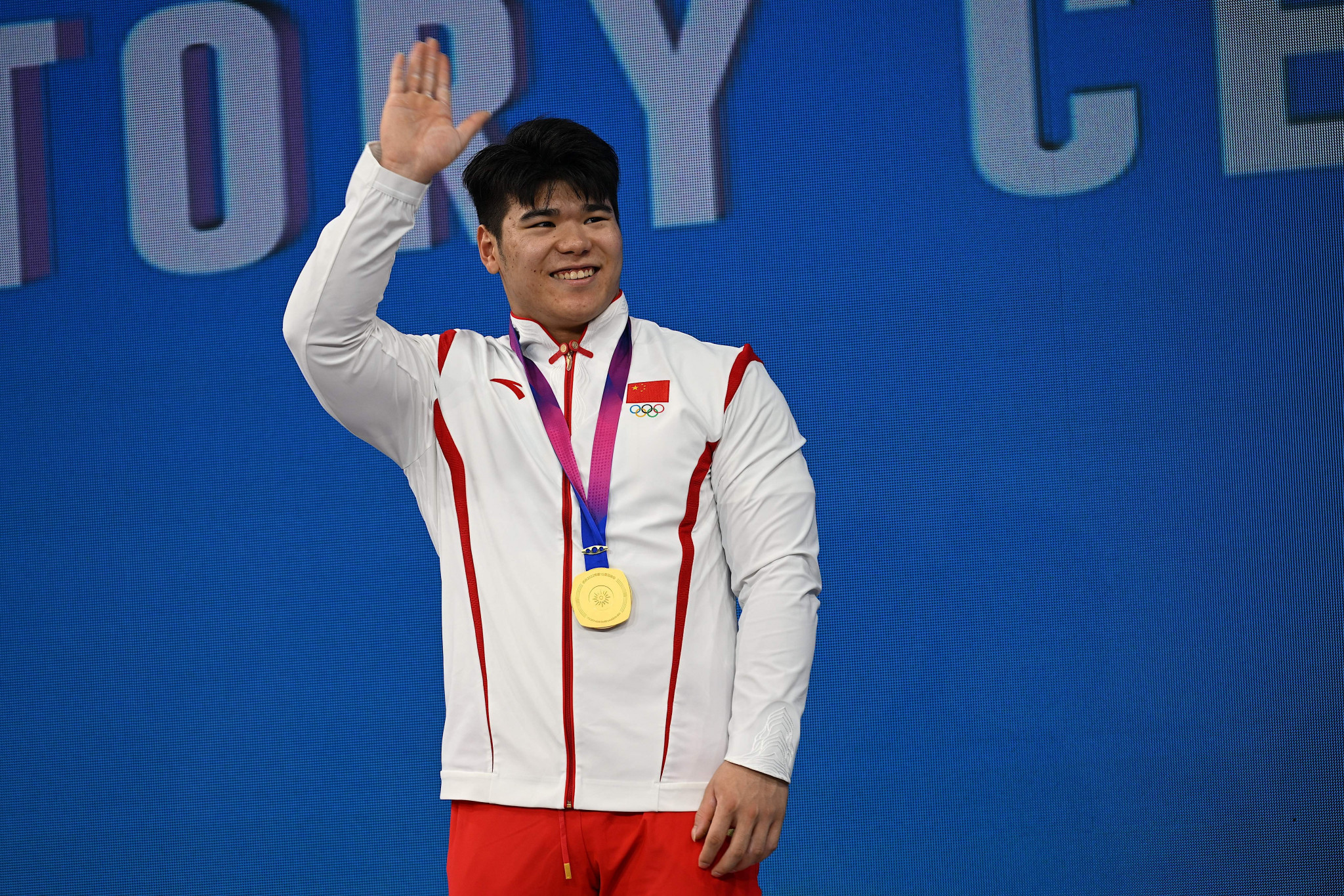 Liu Huanhua of China shocked Olympic champion Akbar Djuraev in the men’s 109kg ©Getty Images