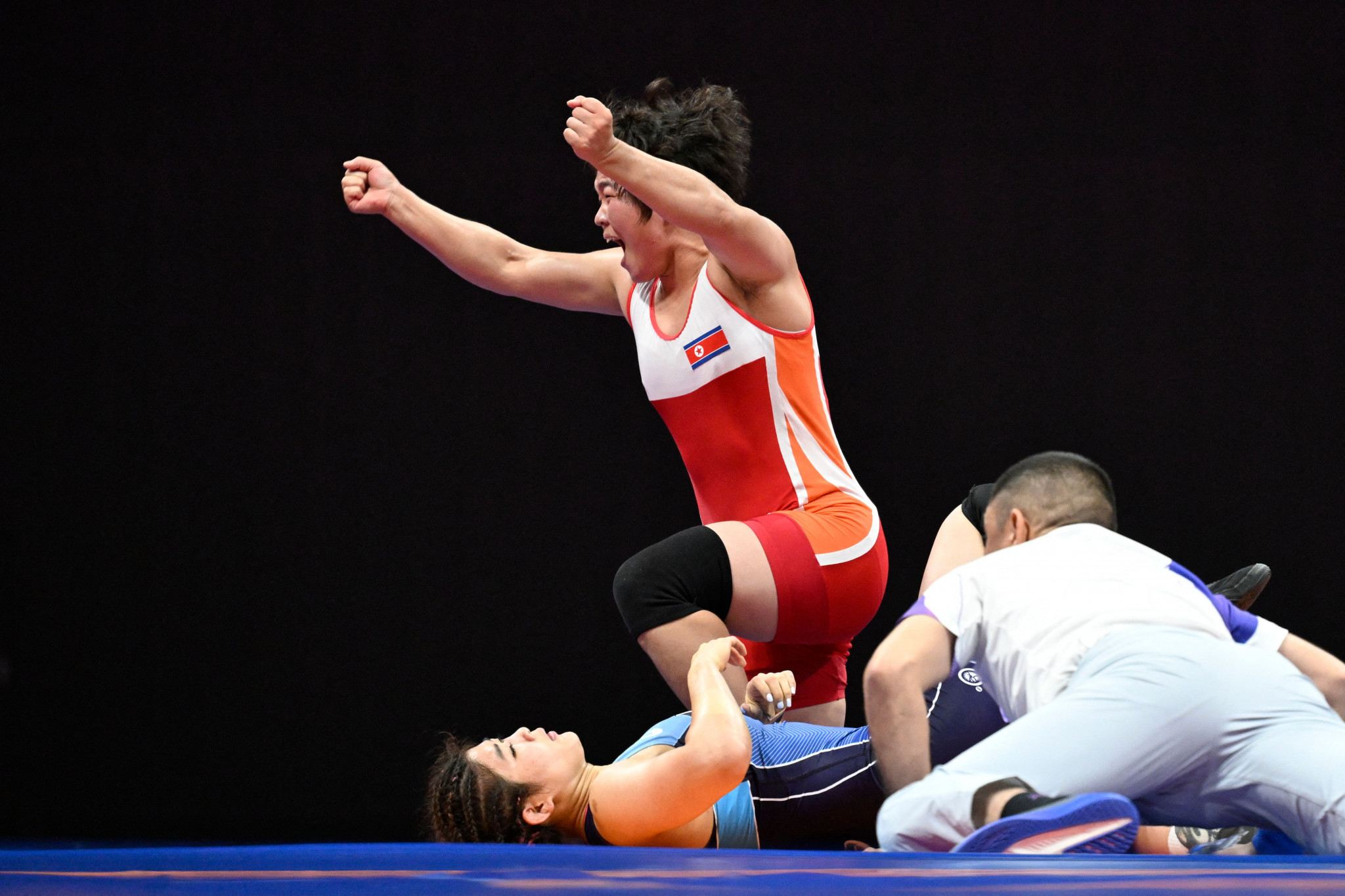 North Korean Mun Hyong-yong produced a fantastic comeback to win the women's under-63kg freestyle wrestling gold medal after being 6-0 down ©Getty Images