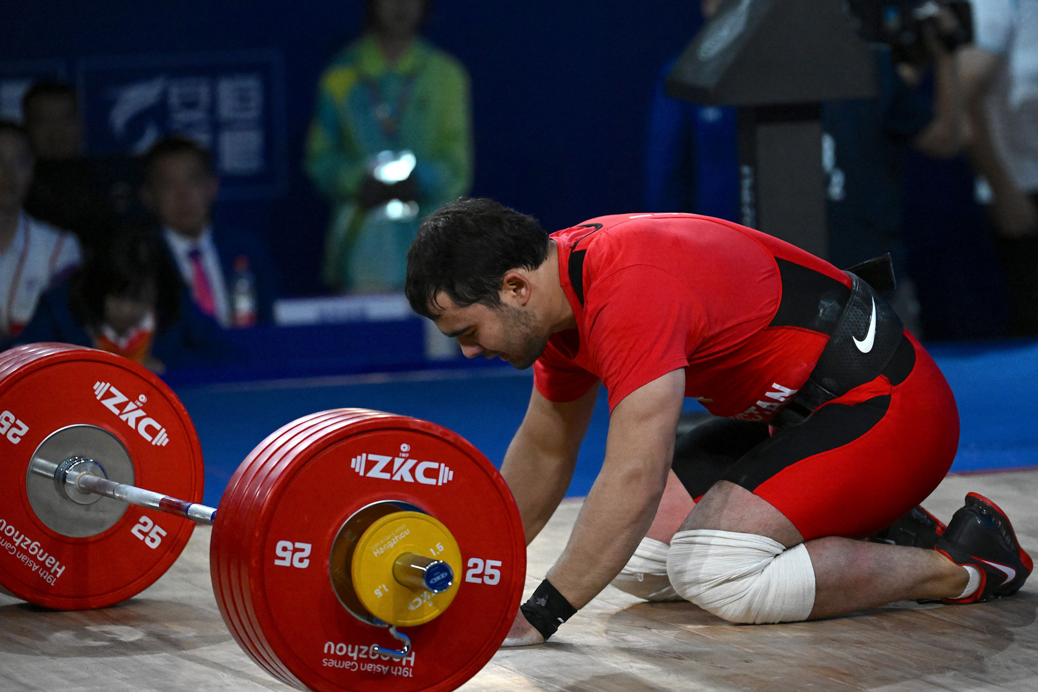 Uzbekistan's Akbar Djuraev lost out on the men's under-109kg weightlifting gold medal by 1kg to a new Games record from China's Liu Huanhua ©Getty Images