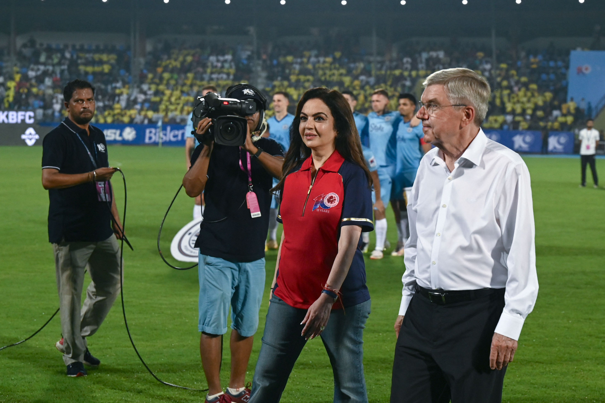 IOC President Thomas Bach, right, joined IOC member in India Nita Ambani for an ISL football match ©Getty Images