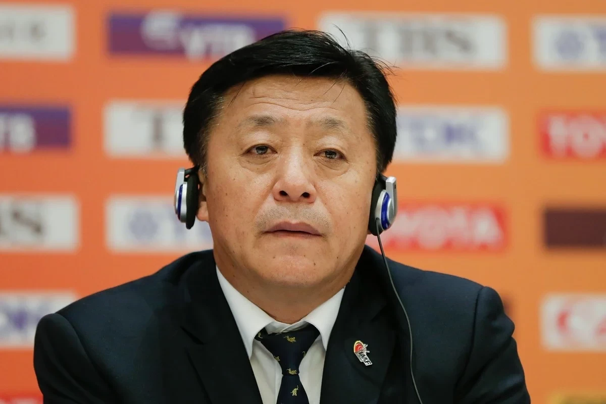 Arrest warrant issued for top Chinese sports official Du Zhaocai accused of bribery