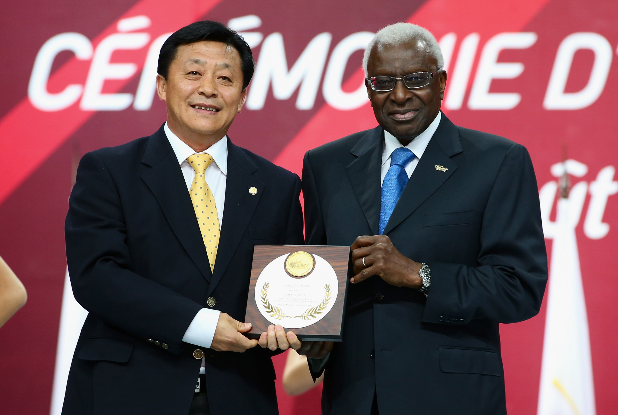 
Du Zhaocai, left, was a member of the IAAF Council under its late President Lamine Diack, right, later convicted of corruption ©Getty Images

