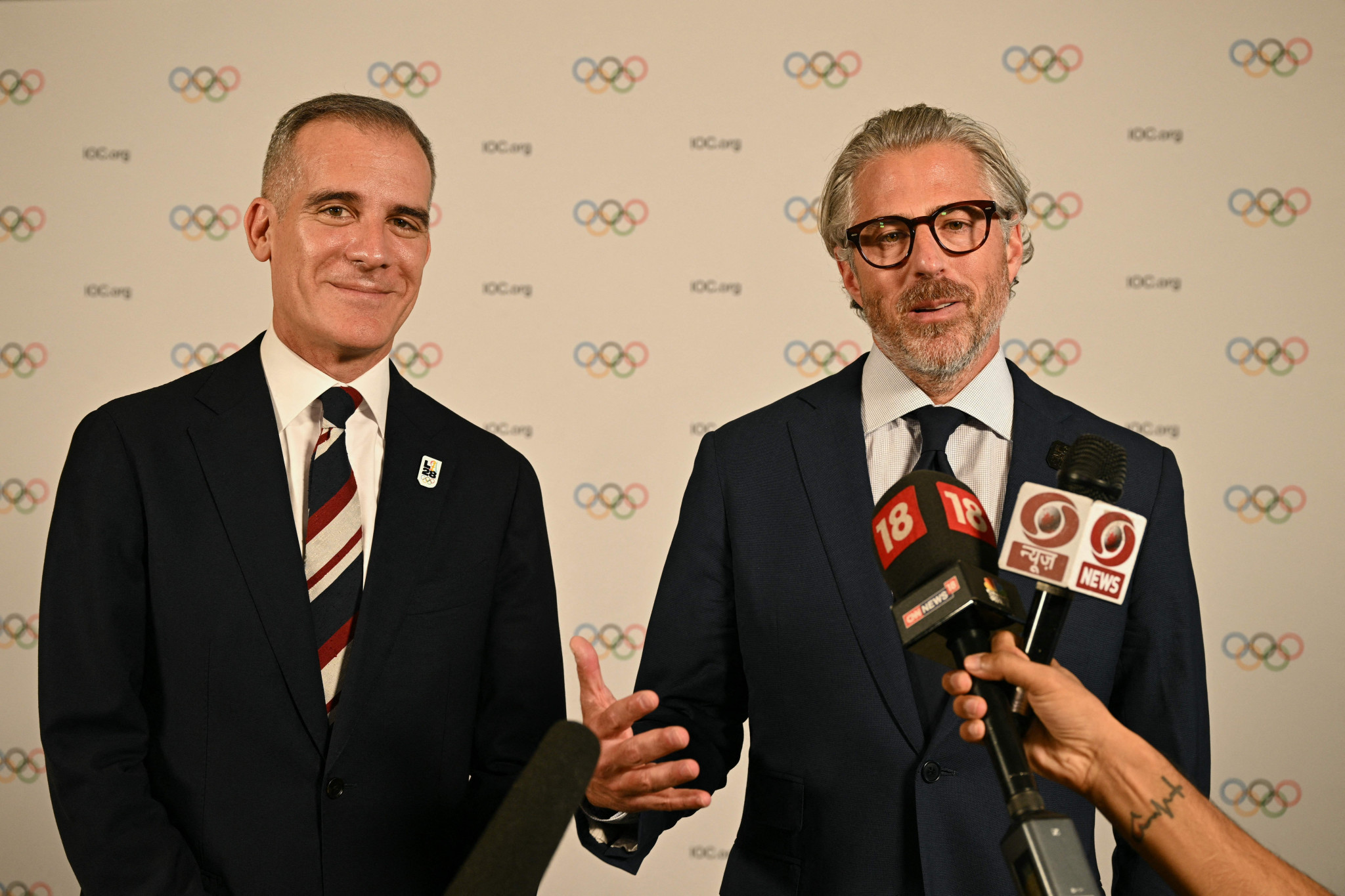 Former Los Angeles Mayor Eric Garcetti, left, joined Casey Wasserman, right, for the presentation to the IOC Session ©Getty Images