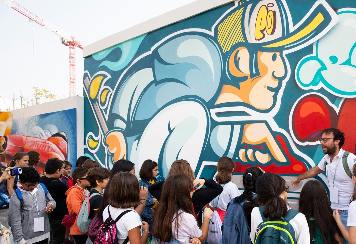 A street art mural has been created along the perimeter of the Athletes Village for Milan Cortina 2026, featuring the work of 20 artists ©Milan Cortina 2026