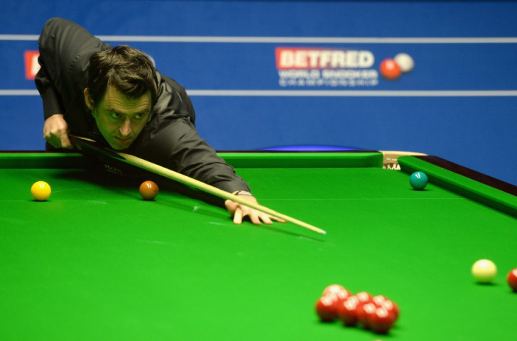Ronnie O'Sullivan, pictured at this year's World Snooker Championships, was chastised by World Snooker chairman Barry Hearn for choosing not to pursue a maximum 147 break because he considered the bonus of £10,000 as being 