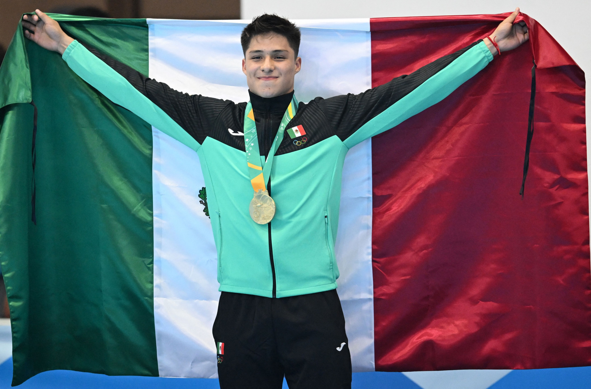 Diver Osmar Olvera won men's 1m springboard gold on a strong opening day for Mexico ©Getty Images
