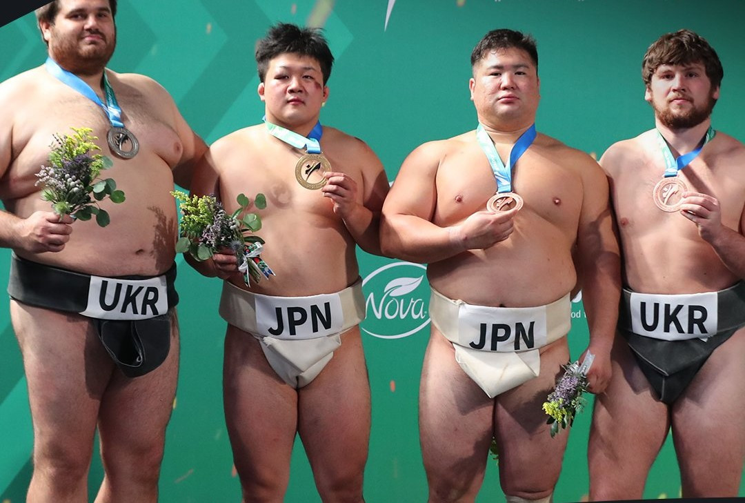 Hayato Miwa of Japan, second from left, won the men's open weight sumo title ©Riyadh 2023