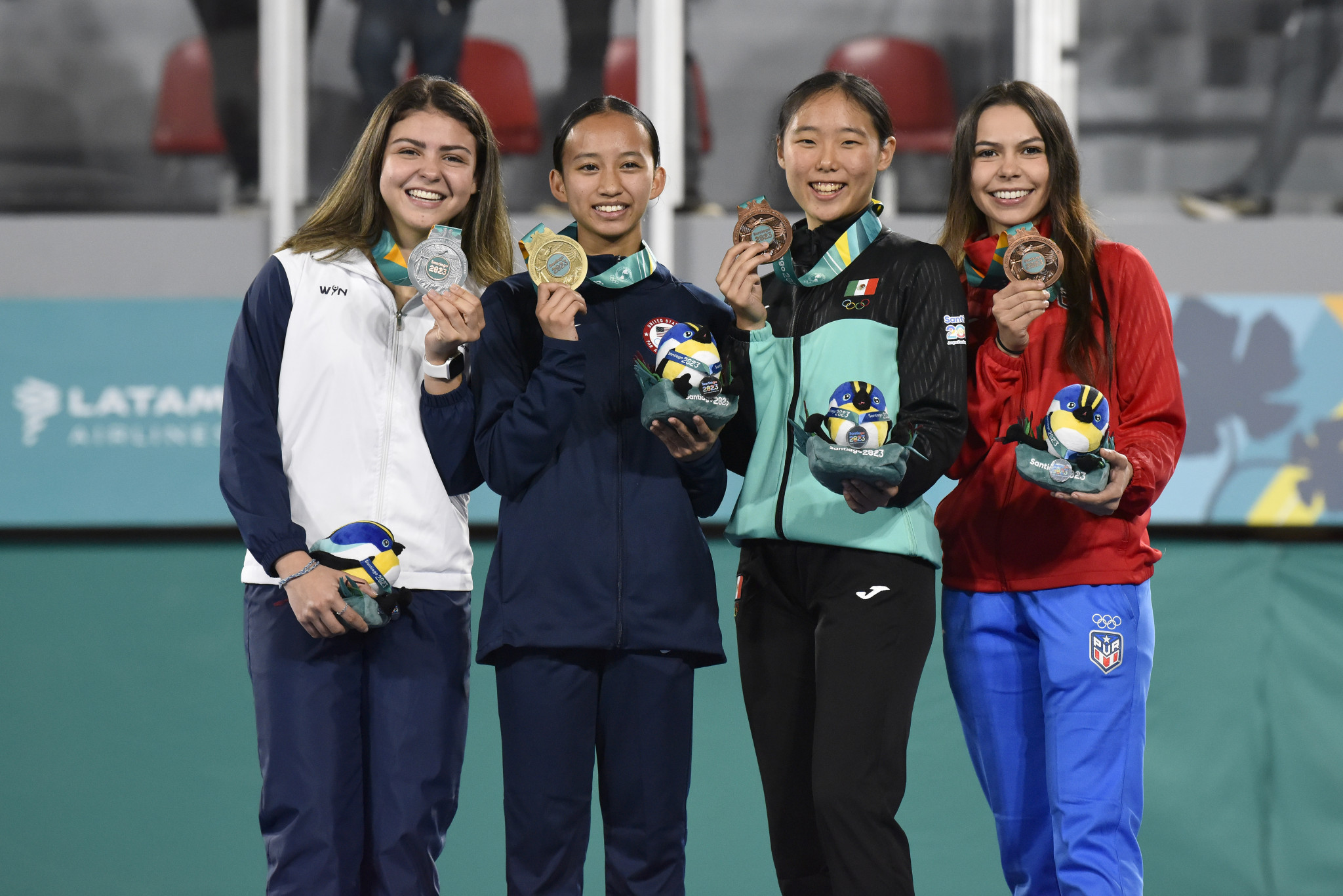 Maria Higueros, left, was the first Guatemalan to win a Pan American Games medal at Santiago 2023 when she took silver in the women's individual poomsae competing as a neutral under the Panam Sports Flag ©Getty Images