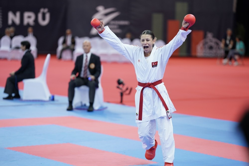 Turkey's Fatma Naz Yenen celebrates wildly after winning her women's under-61kg semi-final ©WKF