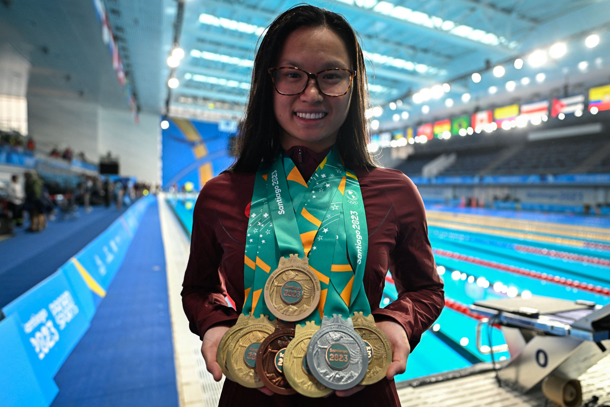 Maggie MacNeil celebrated winning a record fifth Pan American Games gold - taking her overall total of medals at Santiago 2023 to seven - as swimming concluded in Chile's capital ©Getty Images