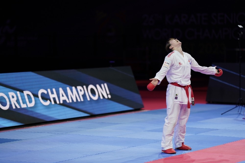 Japan's Ayaka Saito is relieved after winning the women’s over-68kg final ©WKF