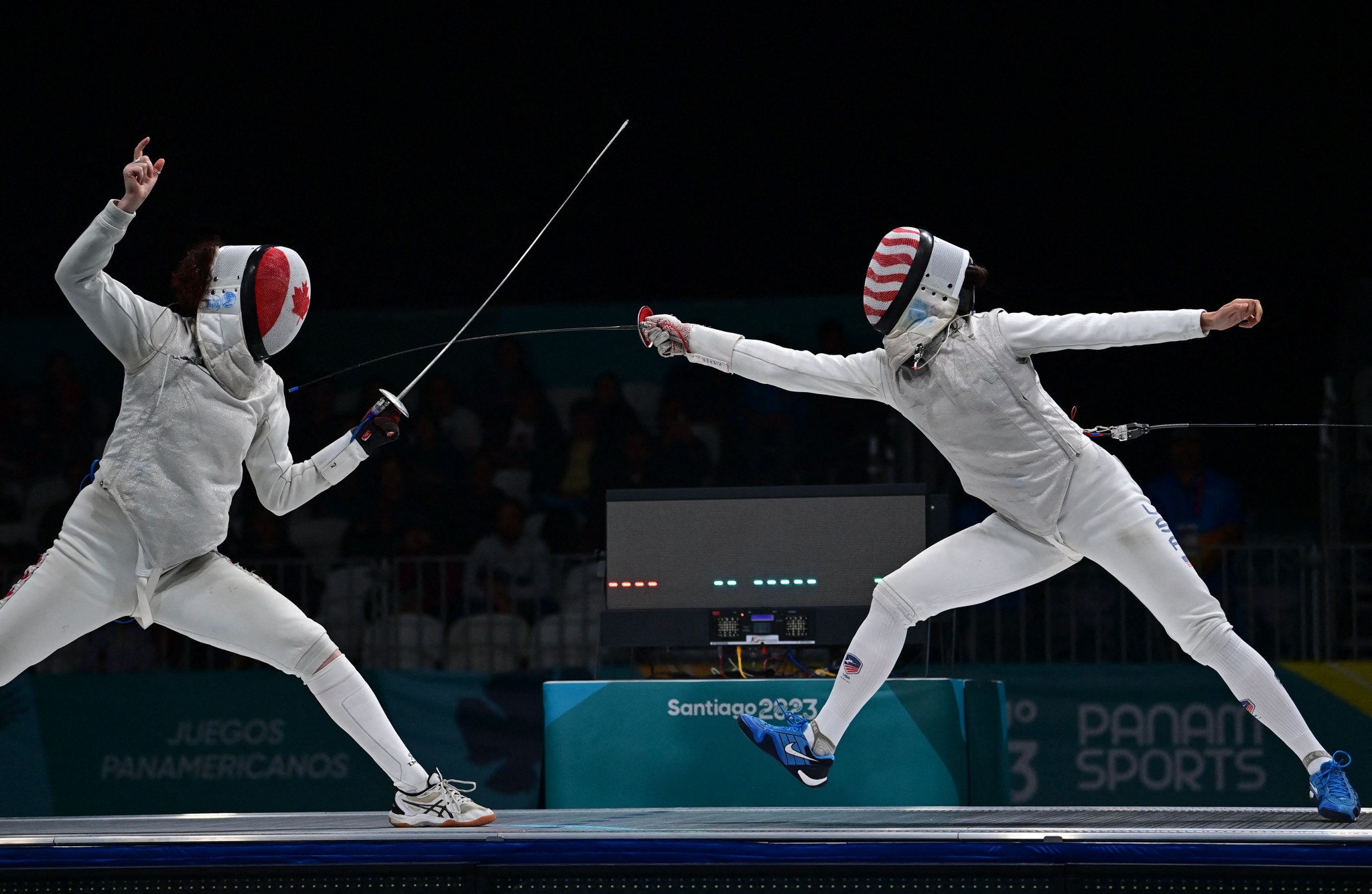 
Lee Kiefer of the United States, right, won the women's foil gold by defeating Canadian Eleanor Harvey 15-6 in the final ©Getty Images
