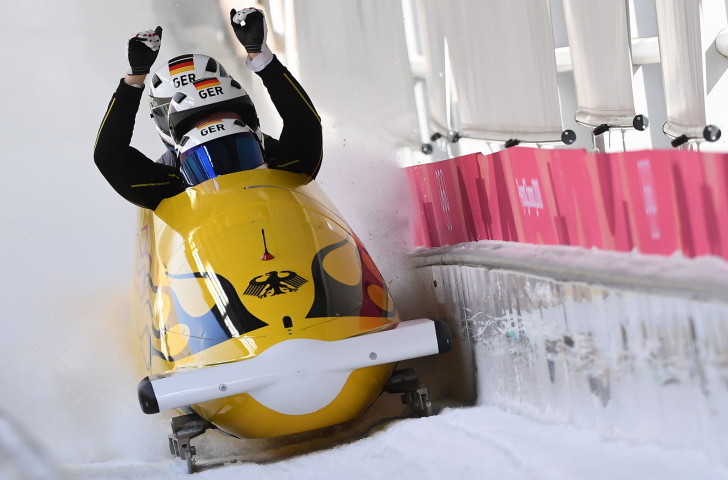 Lochner, unstoppable, takes both events in the four-man bobsleigh in Yanqing.   Getty Images