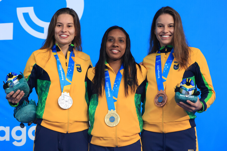 © Photo Javier Valdes /Parapanamericanos 2023 by Photosport Ana Soares from Brazil receives a gold medal along with Debora Borges from Brazil who receives a silver medal and Beatriz Borges from Brazil who receives a bronze medal competes in women's 200m m