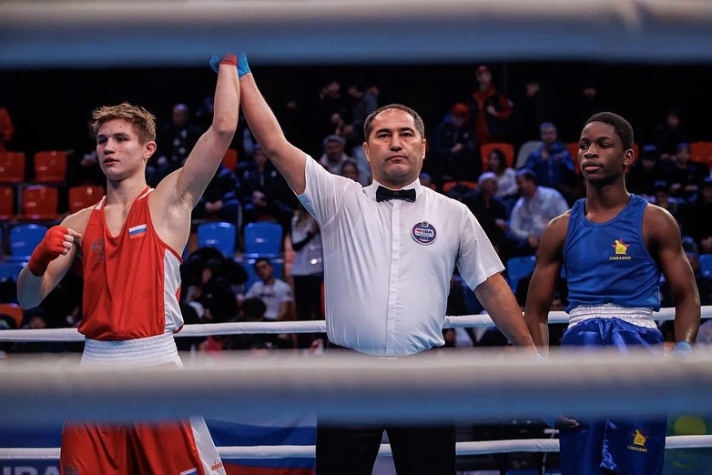 Platon Kozlov from Russia (in the red) after winning his fight against Lennox Chigango from Zimbabwe © IBA