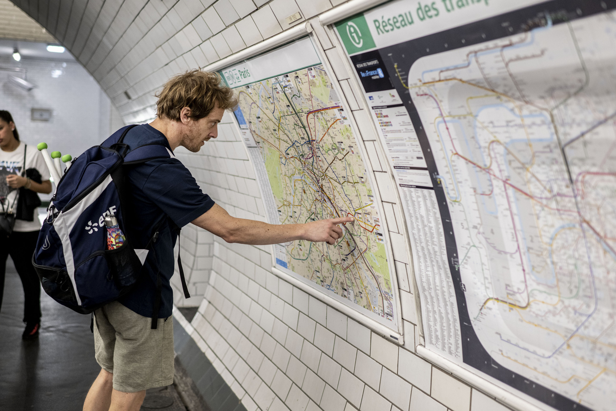 Gary Hunt of France checks the Metro stops while making his way to the training day of the second stop of the Red Bull Cliff Diving World Series on June 16, 2023 in Paris. ©Dean Treml/Red Bull