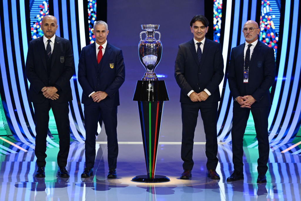 HAMBURG, GERMANY - DECEMBER 02: Luciano Spalletti, Head Coach of Italy, Sylvinho, Head Coach of Albania, Zlatko Dalic, Head Coach of Croatia, and Luis de la Fuente, Head Coach of Spain, pose for a photo with the UEFA EURO 2024 trophy after being drawn into group B following the UEFA EURO 2024 Final Tournament Draw at Elbphilharmonie on December 02, 2023 in Hamburg, Germany. (Photo by Alexander Scheuber/Getty Images)
