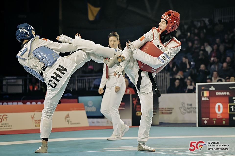 Sarah Chaari from Belgium (in the red) in action against China's Mengyu Zhang © World Taekwondo