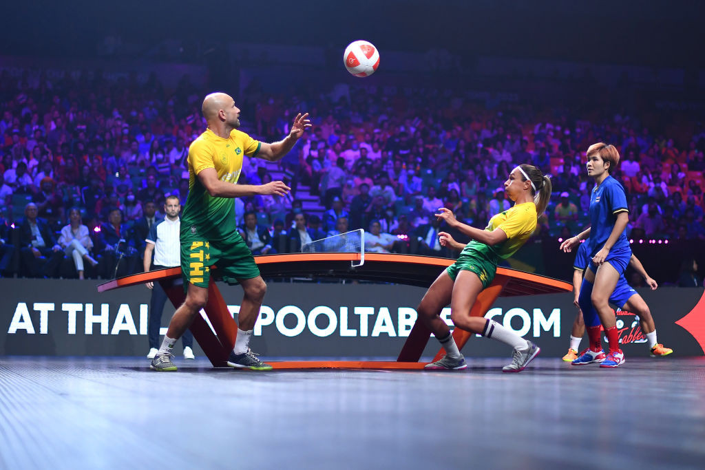 BANGKOK, THAILAND - DECEMBER 03: Leonardo Lindoso De Almeida and Vania Moraes Da Cruz of Brazil compete against Suphawadi Wongkhamchan and Phakpong Dejaroen of Thailand in the Mixed Doubles Gold match between Thailand and Brazil during day 5 of the 2023 Teqball World Championship at Bangkok Arena on December 03, 2023 in Bangkok, Thailand. (Photo by Albert Perez/Getty Images for Teqball World Championship)
