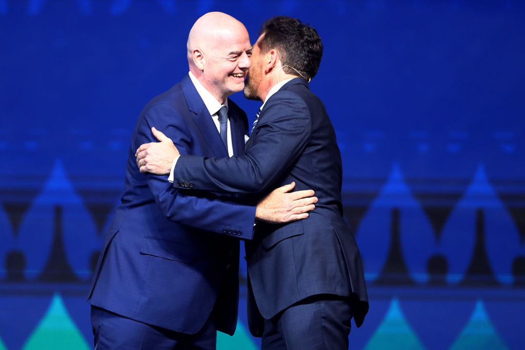 MIAMI, FLORIDA - DECEMBER 07: (L-R) Gianni Infantino, President of FIFA, greets Alejandro Dominguez, President of CONMEBOL, during the official draw of CONMEBOL Copa America 2024 at James L. Knight Center on December 07, 2023 in Miami, Florida. (Photo by Megan Briggs/Getty Images)
