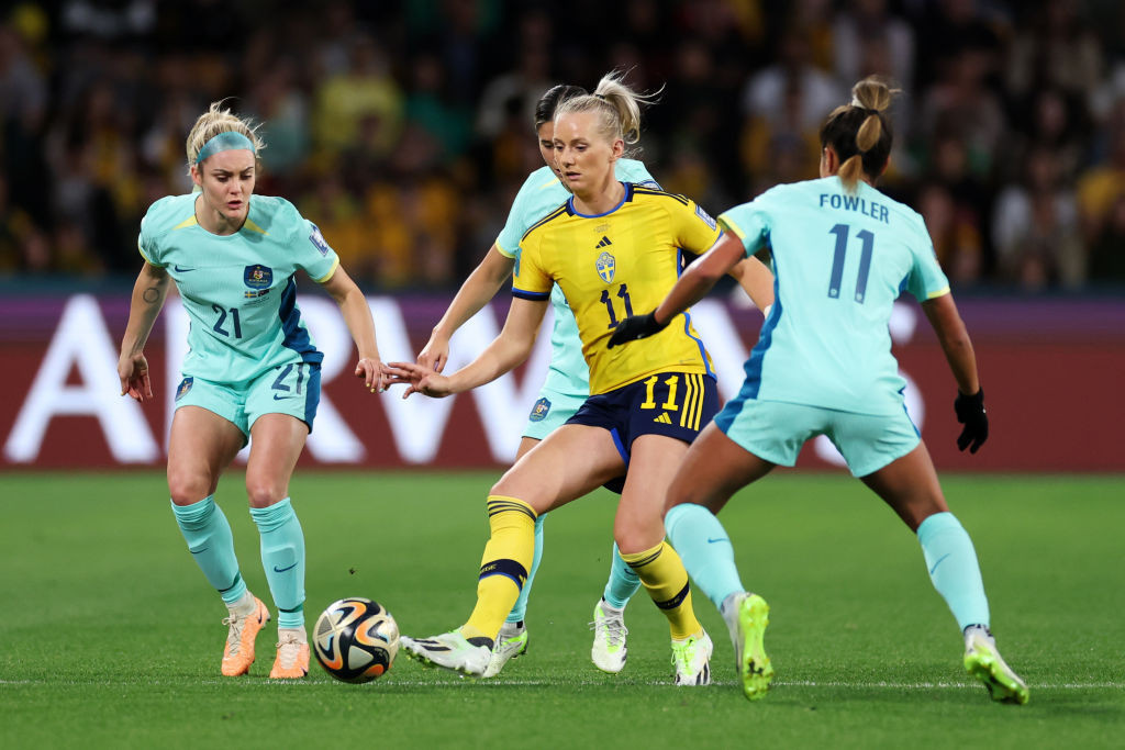 BRISBANE, AUSTRALIA - AUGUST 19: Stina Blackstenius of Sweden controls the ball under pressure from Ellie Carpenter and Mary Fowler of Australia during the FIFA Women's World Cup Australia & New Zealand 2023 Third Place Match match between Sweden and Australia at Brisbane Stadium on August 19, 2023 in Brisbane, Australia. (Photo by Cameron Spencer/Getty Images)
