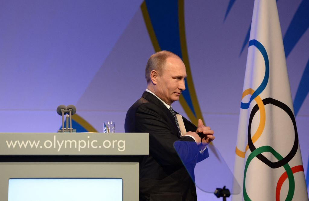 Russian President Vladimir Putin leaves the stage after his speech at the International Olympic Committee (IOC) Gala Dinner on February 6, 2014 in Sochi © Getty Images 